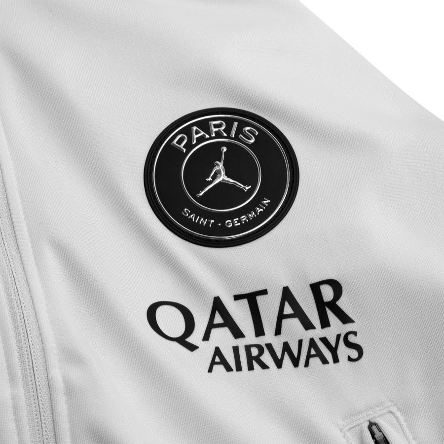 Paris Saint Germain Tracksuit Dri-FIT Strike Jordan x PSG Night Edition - White/Atmosphere Grey/Black Kids-SoccerKits Hub | Buy Soccer Jerseys Online